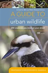 Book cover of A Guide To Urban Wildlife by Prof. Christopher B. Daniels