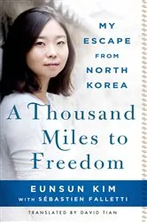 Book cover of A Thousand Miles to Freedom by Eunsun Kim