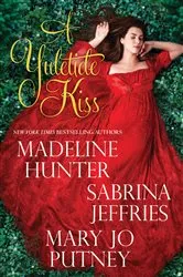 Book cover of A Yuletide Kiss by Madeline Hunter