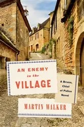 Book cover of An Enemy in the Village by Martin Walker