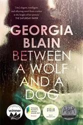 Book cover of Between a Wolf and a Dog by Unknown