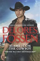 Book cover of Blame It on the Cowboy by Delores Fossen