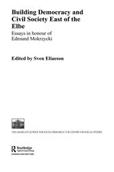 Book cover of Building Democracy and Civil Society East of the Elbe by Sven Eliaeson