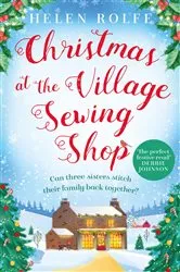 Book cover of Christmas at the Village Sewing Shop by Helen Rolfe