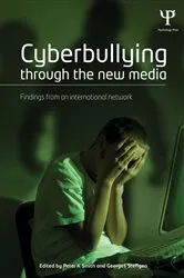 Book cover of Cyberbullying through the New Media by Peter Smith