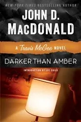 Book cover of Darker Than Amber by John D. MacDonald