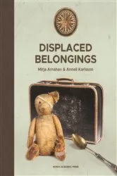 Book cover of Displaced belongings by Mirja Arnshav