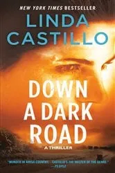Book cover of Down a Dark Road by Linda Castillo