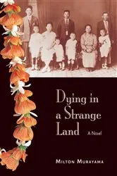 Book cover of Dying in a Strange Land by Milton Murayama
