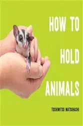 Book cover of How to Hold Animals by Toshimitsu Matsuhashi