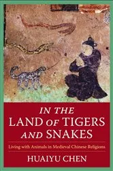 Book cover of In the Land of Tigers and Snakes by Huaiyu Chen