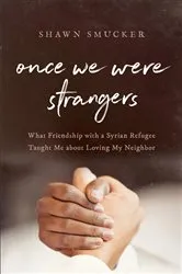 Book cover of Once We Were Strangers by Shawn Smucker