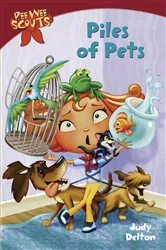 Book cover of Pee Wee Scouts: Piles of Pets by Judy Delton