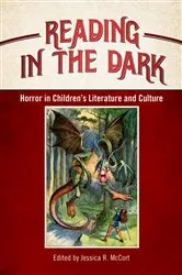 Book cover of Reading in the Dark by Jessica R. McCort