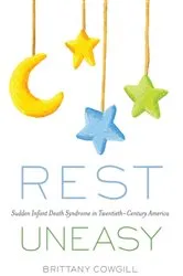 Book cover of Rest Uneasy by Brittany Cowgill