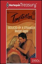 Book cover of Seduced by a Stranger by Brenda Jackson