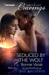 Book cover of Seduced by the Wolf by Terry Spear