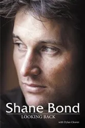 Book cover of Shane Bond - Looking Back by Dylan Cleaver