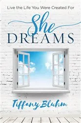 Book cover of She Dreams by Tiffany Bluhm