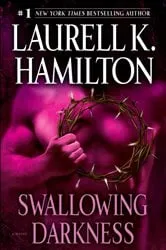 Book cover of Swallowing Darkness by Laurell K. Hamilton