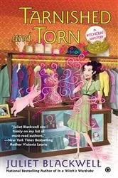 Book cover of Tarnished and Torn by Juliet Blackwell