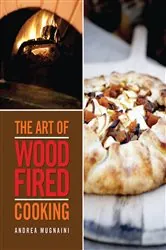 Book cover of The Art of Wood-Fired Cooking by Andrea Mugnaini