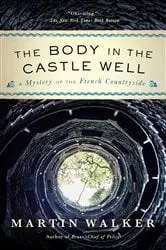 Book cover of The Body in the Castle Well by Martin Walker