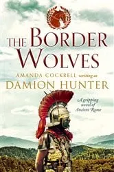 Book cover of The Border Wolves by Damion Hunter