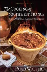 Book cover of The Cooking of Southwest France by Paula Wolfert