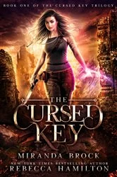 Book cover of The Cursed Key by Miranda Brock