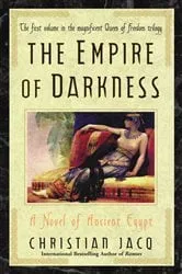 Book cover of The Empire of Darkness by Christian Jacq