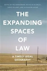 Book cover of The Expanding Spaces of Law by Unknown