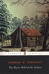 Book cover of The House Behind the Cedars by Charles W. Chesnutt