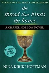 Book cover of The Thread That Binds the Bones by Nina Kiriki Hoffman