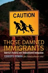 Book cover of Those Damned Immigrants by Ediberto Román