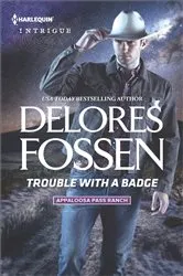 Book cover of Trouble with a Badge by Delores Fossen