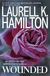 Book cover of Wounded by Laurell K. Hamilton